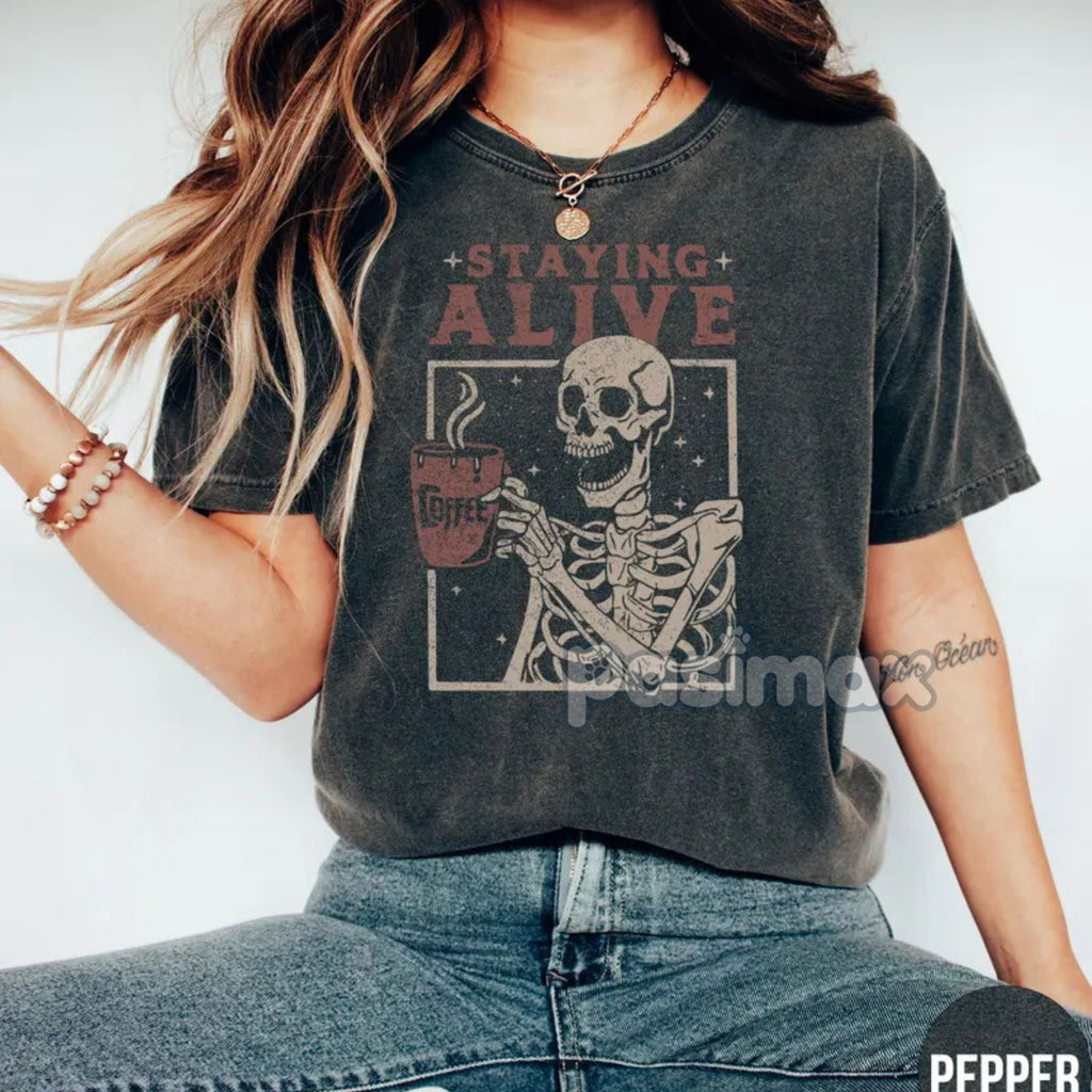 'Staying Alive' Coffee Shirt – Skeleton Retro T-shirt, Funny Coffee Lovers Gift, Daily Grind Tee, Women's Comfort Colors Apparel
